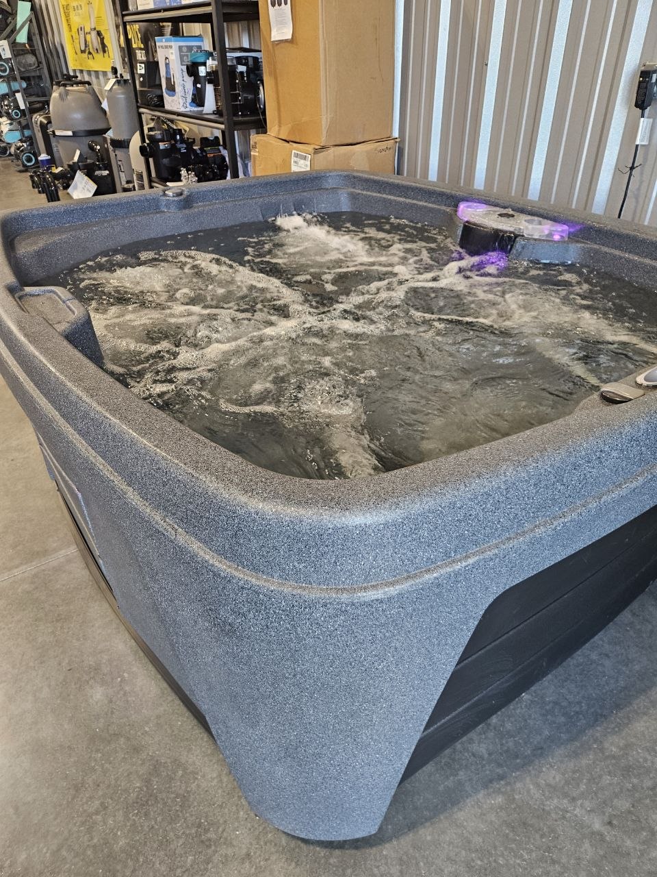 Compact hot tub with jets running - AquaZen clearance sale