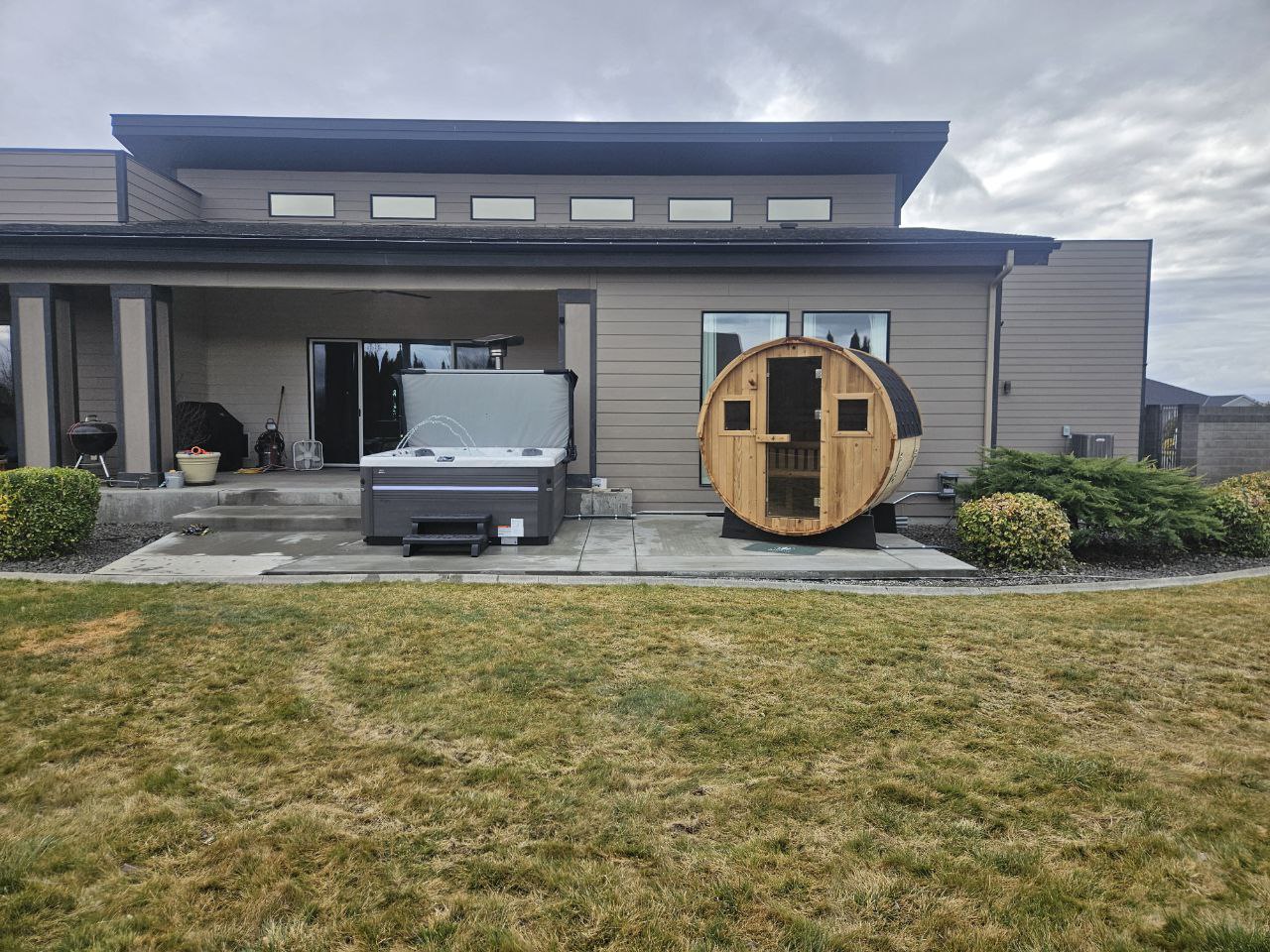 Hot tub and barrel sauna delivery - backyard install