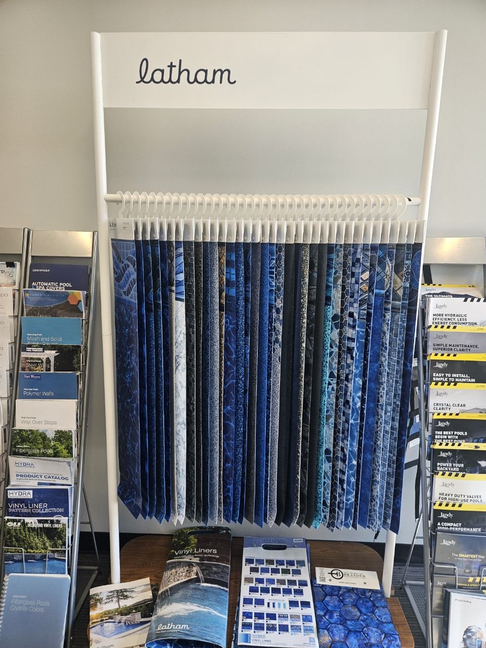 Latham pool liner sample display at AquaZen showroom in Richland WA