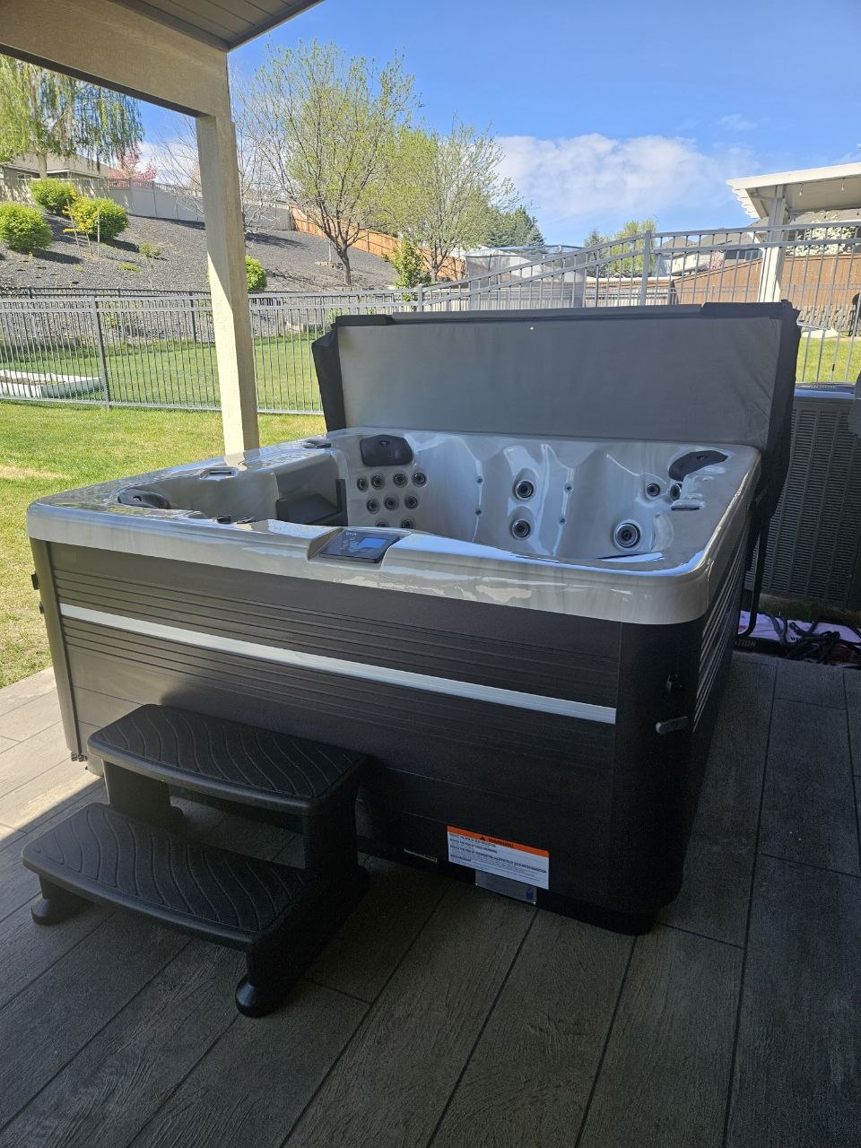 Vita Spa hot tub delivered and installed on patio in Tri-Cities WA by AquaZen Pool Spa Sauna