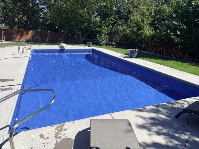 After: beautiful new deep blue pool liner installed — AquaZen pool liner replacement Tri-Cities WA