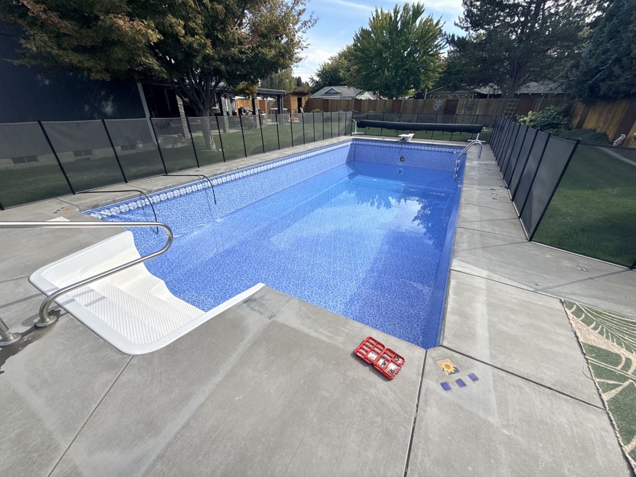 New pool liner after replacement — bright blue and beautiful